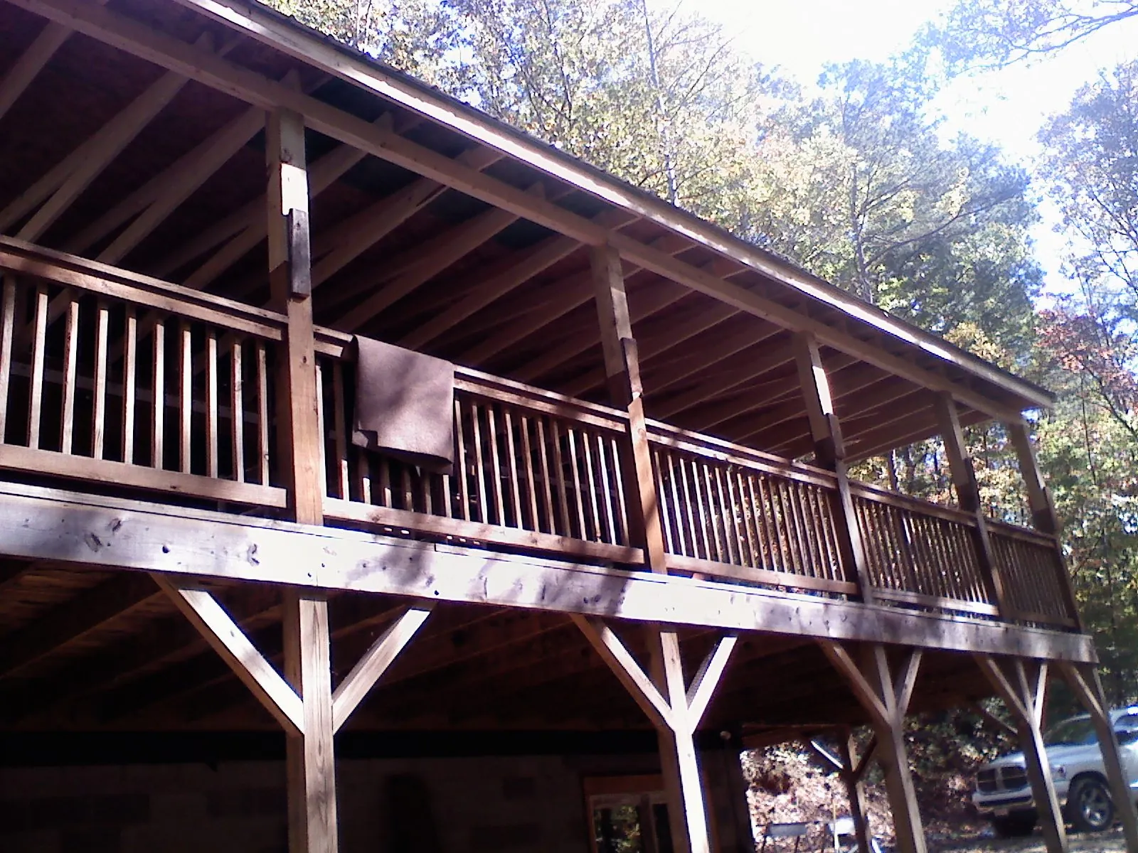 Timber framing under a new elevated porch and deck — Roof Leak Repair in Needham Heights by Roofing Brothers